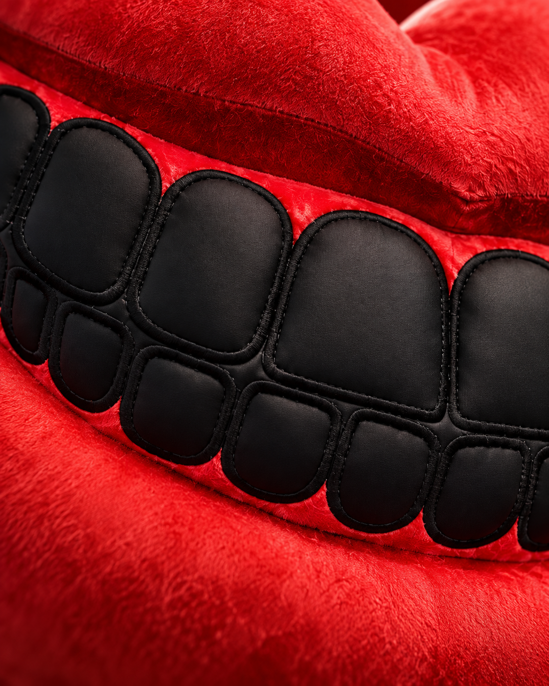BLACKOUT campaign close-up of the red mouth and black grill.